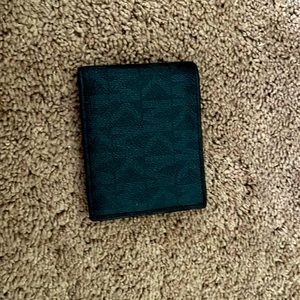 Black Michael Kors mens wallet, lightly used